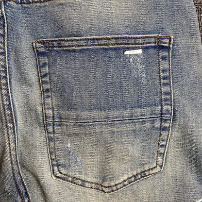 AMIRI VARSITY LOGO JEANS