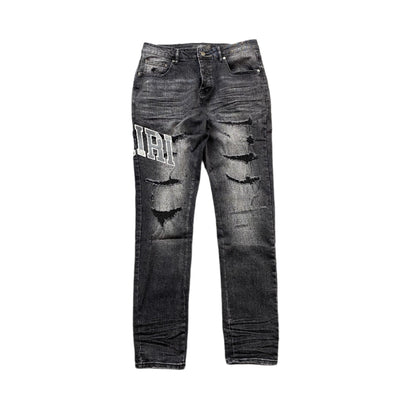 AMIRI VARSITY LOGO REPAIR JEANS